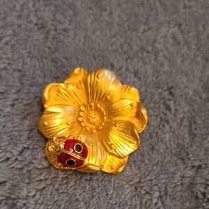 Brushed Goldtone Flower Brooch with Red & Black Enamel Articulated Ladybug